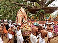 Malarāya Daiva on white boar chariot