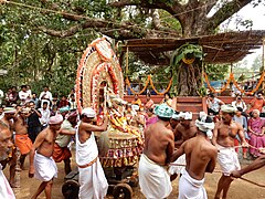 Malaraya Daiva on white boar chariot