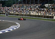 Former Formula One world champion Nigel Mansell driving at Silverstone in 1990. The circuit hosted the first ever World Championship Formula One race in 1950. Mansell in his Ferrari 641 - 1990 British GP.jpg