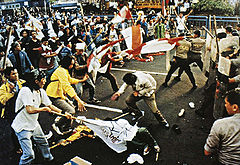 Image 41University students and police forces clash in May 1998. (from History of Indonesia)