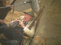 Michael Gambon as Private Godfrey, on the set of Dad's Army in October 2014. Filming took place on the beach at North Landing, Flamborough Head, Yorkshire, and at nearby Bridlington.