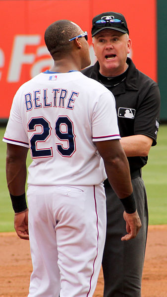 Everitt and Adrián Beltré playfully argue during a 2014 game