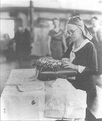 Mme. Soulier, bobbin lace maker at the Canadian Handicraft Exhibition at the Manitoba Agricultural College, Fort Garry (June 1933) Mme. Soulier, bobbin lace maker at the Canadian Handicraft Exhibition at the Manitoba Agricultural College, Fort Garry.jpg