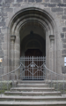English: Protestant church (portal) in Muecke Merlau, Hesse, Germany