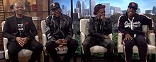 Members with Bobby Brown as New Edition during a 2018 interview. From left to right: Ronnie DeVoe, Bobby Brown, Ricky Bell, and Michael Bivins.