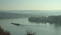 Čeština: Nákladní loď na Dunaji v Novém Sadu; v pozadí Most Svobody a také Fruška Gora, Srbsko English: A cargo ship on the Danube River in Novi Sad, Serbia. The Most Slobode Bridge and Fruška Gora Hills can be seen in the distance Српски / srpski: Теретни брод на Дунаву у Новом Саду. У позадини на слици се налазе исто и Мост Слободе и Фрушка Гора