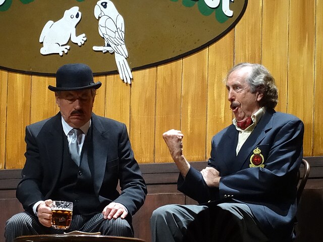 Idle (right) and Terry Jones performing the "Nudge Nudge" sketch at the Python reunion in 2014