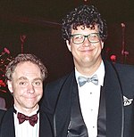 Photographic portrait of Penn Jillette (right) and Teller (left)