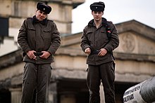 East German Border Guard soldiers at the Berlin Wall in 1989. Police on the Berlin Wall.JPEG