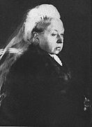 Queen Victoria, an elderly woman dressed in black.