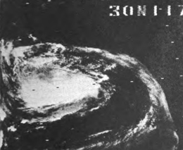 Grayscale satellite image of a typhoon