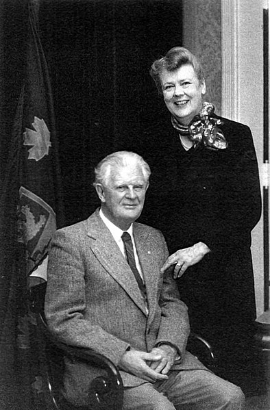 George Stanley (left), designer of the Canadian national flag and lieutenant governor of New Brunswick from 1981 to 1987, with his wife, Ruth