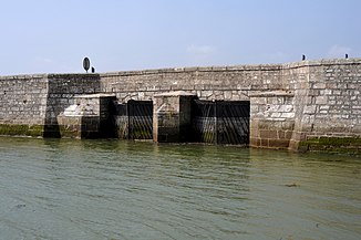 Lock bridge over the Saire at its mouth