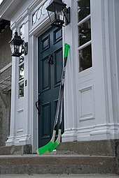 Hockey sticks left on front porches in tribute to the victims Sticks out for Humboldt (39578490530).jpg