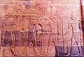 Nel bassorilievo posto nell'area consacrata a Horus Tolomeo XII riceve l'Ankh e la corona da Thoth, Nut, Iside al cospetto di Horus e Ra