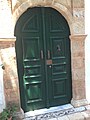 The door on the narrow street of the Old Town of Lindos, Rhodes, Greece.JPG