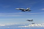 Three RAAF FA-18 Hornets in formation after refueling.jpg