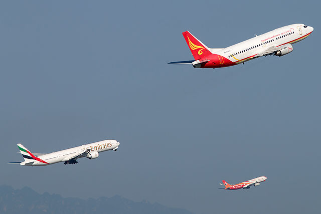 Three airliners taking off simultaneously (note similar pitch attitudes)