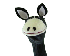 A sock puppet decorated with eyes, a mouth and ears