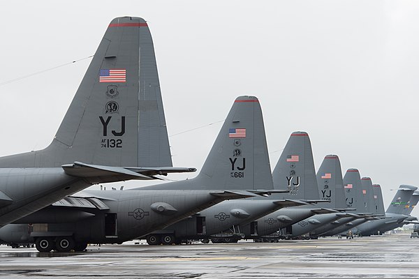 US Air Force C-130 Hercules of the 36th Airlift Squadron parked on the Yokota flight-line during 2013. The aircraft feature the 'YJ' Yokota tail code.