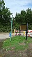 English: The bus stop at the Folly Inn, Folly Lane, Whippingham, Isle of Wight, Southern Vectis route 25. Until 4 September 2010, the stop was served by Wightbus route 29. Route 29 was withdrawn with the 5 September 2010 timetable changes, partially replaced by the 25, 33 and 33A. This section in particular was replaced by route 25, giving links to Newport and East Cowes, but no longer to Ryde. For some reason, apparently due to the terrible road surface, during the period before it was withdrawn, route 29 did not continue to the end of Folly Lane to this bus stop at Folly Inn pub, instead turning around just up the road at Medina Park. Southern Vectis however decided to serve this stop from the start of the new service however, although the bus stops flags were not put up in time for the route to start. In comparison with this photo taken a month earlier, it can be seen Wightbus have removed their flag and timetable case.