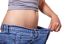 Fad diets are popular non-standard diets that often promise dramatic weight loss. However, they are usually not supported by scientific evidence, and they sometimes offer dangerous dietary advice. Young woman wearing loose jeans.jpg