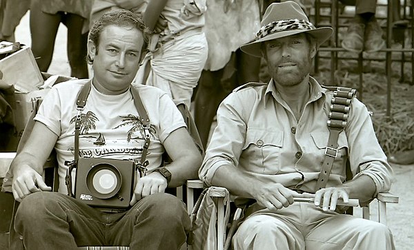 Chamberlain and photographer Yoni S. Hamenachem on the set of King Solomon's Mines in Zimbabwe.