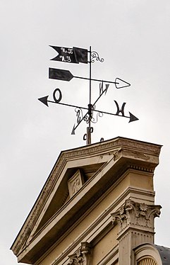 Weather vane on a gable house