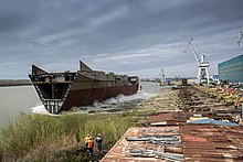 Launch of hull sections 2 & 3 110422-tewaterlating-rompdeel-combat-support-shop.jpg