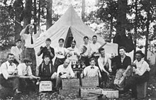 A group of friends from Allentown, Pennsylvania, celebrating Independence Day in 1913 with a case of Moxie 1914 - Allentown Independence Day Outing.jpg