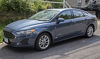 2019 Ford Fusion Hybrid SE, Blue, front left.jpg