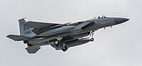 A US Air Force F-15C Eagle, tail number 85-0115, on final approach at Kadena Air Base in Okinawa, Japan