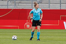 image of Kirsty Dowle refereeing a Germany versus Serbia match