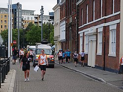 The Queen's Baton Relay for the 2022 Commonwealth Games approaches down Princes Dock Avenue