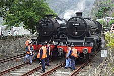 48151 & 45690 Leander parked up side by side after arriving with "The Conwy Quest" railtour on Sat 3 August 2019. 48151 & 45690 Leander parked up side by side in Blaenau Ffestiniog.jpg
