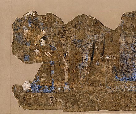Chinese Embassy, carrying silk and a string of silkworm cocoons, 7th century CE, Afrasiyab, Sogdia.[22]