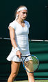 Aleksandra Krunić competing in the first round of the 2015 Wimbledon Championships against Roberta Vinci.