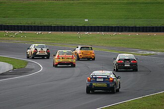 Australian Manufacturers' Championship cars competing in a 6-hour race at Sydney Motorsport Park in 2011. Australian Manufacturers Championship Sydney 2011.JPG