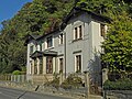 Residential house in open development with fencing