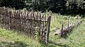 Field with a plaited fence – Feld mit Flechtwerkzaun