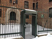 A former entrance to the apartments that has been fenced off Blocked entrance at Marshall field garden apartments.jpg