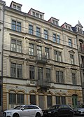 Tenement house with shop fittings, in closed development