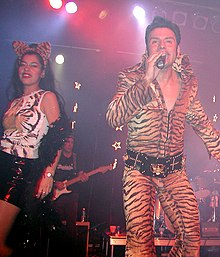 El Vez performing with his backing band the Memphis Mariachis and backing singers the Lovely Elvettes ElVez live.jpg