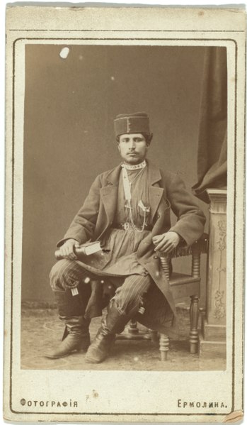 File:Full-length portrait of Persian man, seated, facing front LCCN99615599.tif