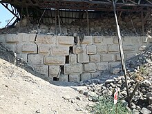 The geological fracture seen on the remains of the northern wall of the Mesad. Geological fracture.jpg