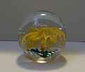 A decorative glass paperweight