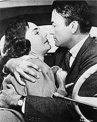 Peck with Jennifer Jones in a film still for The Man in the Gray Flannel Suit (1956) Jennifer Jones, Gregory Peck The Man in the Gray Flannel Suit.jpg