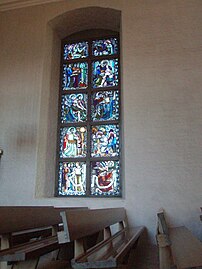 Lidandets fönster, en av fyra glasmålningar (1930) längs korsarmarnas östra väggar.