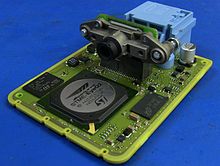 A Mobileye EyeQ2 chip used in a Hyundai Lane Guidance camera module Lane Guidance Camera PCB.jpg