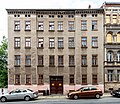 Apartment building in half-open development